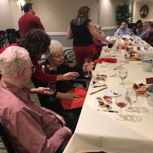The Village of Bedford Walk hosts a Sip & Savor wine and food pairing event for residents.